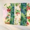 Food bib extra long side snap patchwork strawberries $11 SOLD