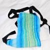 toy soft structured carrier -
this fit my 18 month old and my 6 year old both. they are choosing to keep their baby slings inst